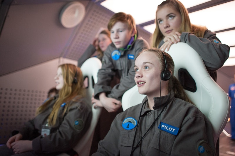 Youths participating in the Spaceship Aurora virtual space mission.