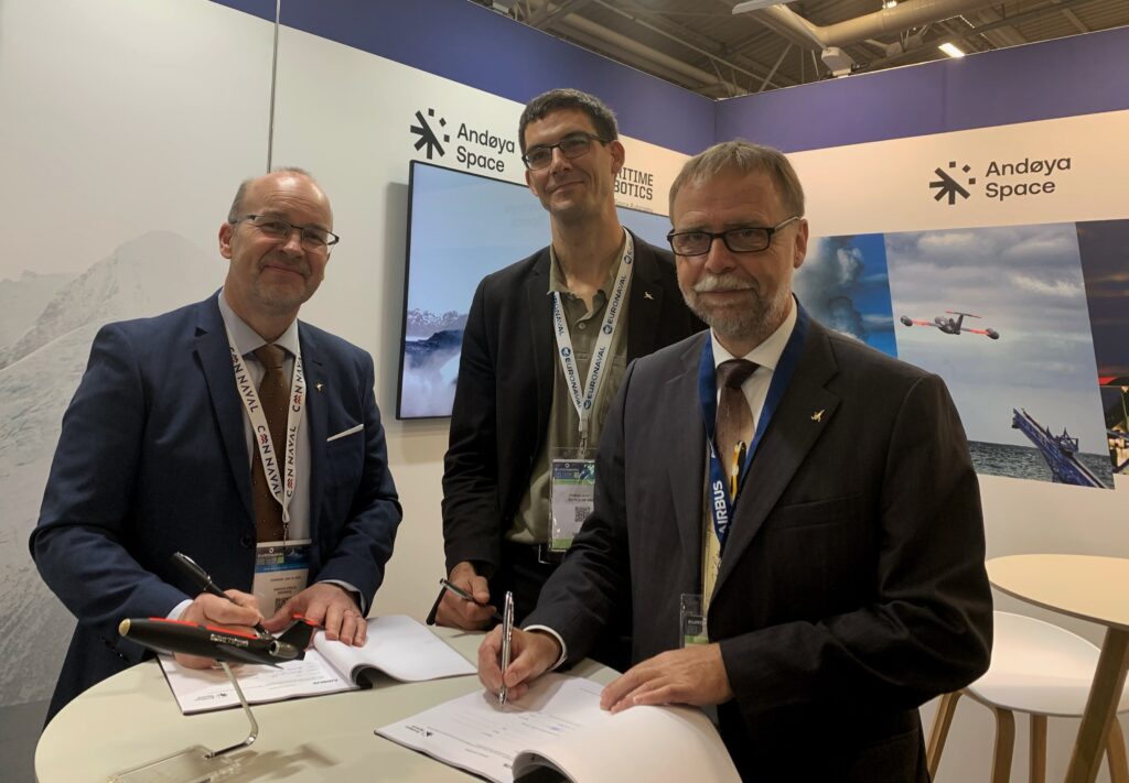 Representatives from Andøya Space Defence and Airbus signing cooperation agreement