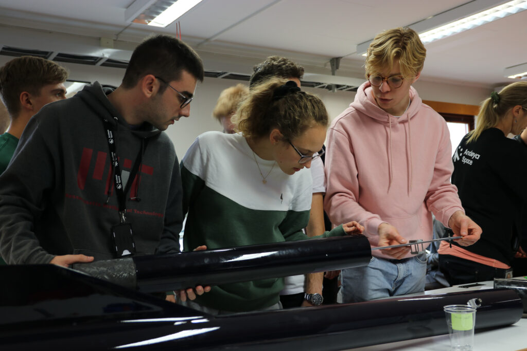 Students working on the payload for the student sounding rocket