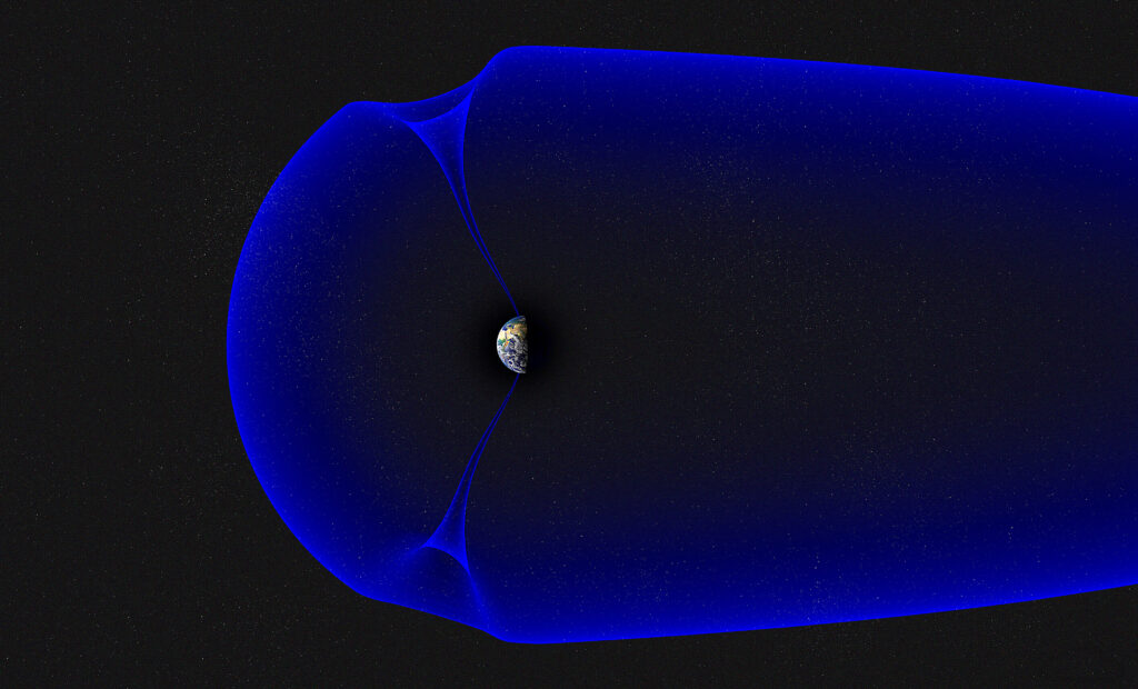 Image with visualization of Earth and its magnetic field in the correct scale